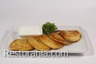 Snack to beer : Potato pancakes with sour cream «Ukrainian melodies»